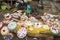 Documentary editorial image.Vendor selling fresh flowers, vegetables, fruits, umbrella for devotees to bless Hindu god Ganesh at l