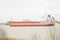 Doel, Antwerp, Belgium - February 2019: Large cargo ship in the harbor