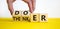 Doer or thinker symbol. Concept words Doer or thinker on wooden cubes. Businessman hand. Beautiful yellow table white background.
