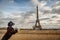 Dog admiring the Eiffel Tower in Paris, France