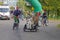 Dog in the bicycle cart takes part in bike parade in Moscow