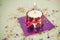 Dog birthday cake with bone cookies, ribbon , candle