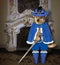 Dog in blue cloak in palace