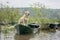 dog in the boat. Labrador Retriever in nature