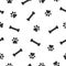 Dog or cat paw and bone seamless pattern. Animals paw print