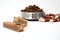 Dog dental treats on white background with selective focus. Dry feed in bowl and bones blurred