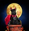 Dog in devil halloween costume