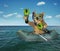 Dog diver drifting in a rubber boat