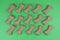 Dog food bones on green background pattern