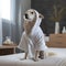 Dog in grooming salon after shower wrapped in towel. Funny dog in a bathrobe sitting on bed after taking bath in a luxury dog spa