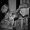 dog with his friends, he kisses one of them while the other is smiling. a loving dog! black and white photography.