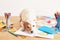 Dog Jack Russell Terrier and chool supplies background. Back to school concept. Items for school. Office desk with copy space.