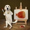 Dog labrador artist paints slice of sausage