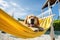 Dog Laid-Back Golden Retriever Unwinding on Vacation on the beach. Generative AI