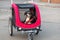 Dog lying in bicycle trailer, appenzeller sennenhund