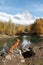 dog in the mountains. Nova Scotia Duck Tolling Retriever on rocks. Hiking with a pet