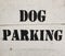 DOG PARKING - A sign in a big city