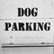 DOG PARKING - A sign in a big city