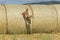 Dog puppy cocker spaniel jumping from wheat ball