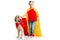 Dog in red cape with supergirl in yellow cape standing beside