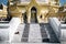 A dog rests on the stairs leading up to Swe Taw Myat Pagoda in Yangon