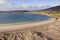 Dog`s bay beach from bird`s eye view. Aerial image. Stunning sandy beach and blue ocean water. County Galway, Ireland. Travel an