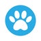 The dog`s track in the blue circle. cat and dog paw print inside circle