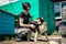 Dog at the shelter. Animal shelter volunteer feeding the dogs