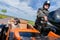 Dog sits with sunglasses in a motorcycle sidecar