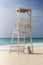 Dog sitting in a shade of lifeguard tower in Cape Verde