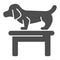 Dog on table solid icon, animal hospital concept, Dachshund standing on table at veterinary office sign on white