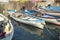 Dogana Veneta and Porticciolo in Lazise, in Italy with colored boats 15