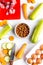 Dogfood set with vegetables, eggs and meat on table background top view