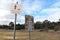 Dogs Must Be On Leash and Fun and Fitness Trail signs at a park