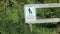 Dogs must be on leash sign-post in a park. Dogs must be on a lead sign. On-leash area.