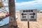 Dogs on and off leash sign on the beach