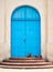 Dogs resting near Pretty Blue Door