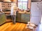 Dogs watching retired owner cooking roast meal for Sunday lunch