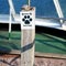 Dogs welcome sign in sandbox on ferry deck. Travel with pets