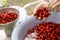 Dogwood berries in bowl for cooking jam with old mechanical scale