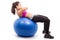 Doing crunches on exercise ball
