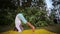 doing handstand yoga mediatation exercise in nature