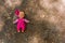 Doll abandoned on the ground