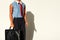 doll body in the image of an office worker with a briefcase in hands