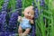 Doll with the garden flowers
