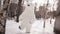 Doll giant bear dancing in a snowy park