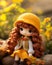 a doll wearing a yellow hat sits on a rock