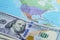 Dollar banknotes on USA world globe map