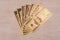 Dollar bills banknotes gold on white wood surface Banknotes