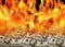 Dollar bills on fire